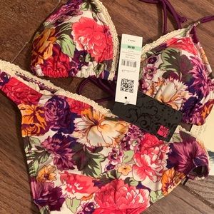 Floral Bikini with Tags still xs/s. Top small bottom xs/small